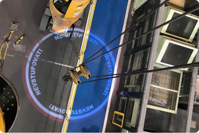 Virtual marking of crane suspended loads